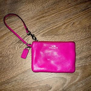 Coach wristlet. Hot pink. Good condition.